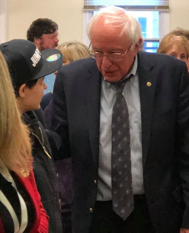 Bernie Sanders speaking with a parent at EES